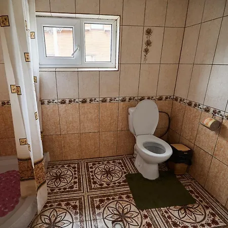 захід сонця Konukevi